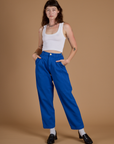 Alex is 5’8” and wearing XXS Heritage Trousers in Royal Blue