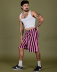 Angled front view of Longline Work Shorts in Bubblegum Pink and vintage tee white Cropped Tank
