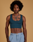 Jerrod is 6’3” and wearing S Mini Tank in Lagoon