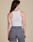 Racerback Tank in Vintage Tee White back view on Alex