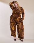 Juliet is wearing Magic Waters Drop Pocket Pants in Honey Brown and matching Long Sleeve Baby Tee
