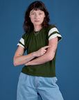 Alex is 5’8” and wearing P Painted Vintage Tee in Evergreen