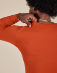 Long Sleeve Baby Tee in Chili Red back shoulder close up