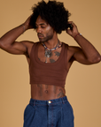 Jerrod is wearing Mini Tank in Fudgesicle Brown