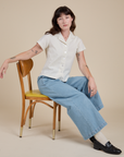 Alex is wearing Pantry Button-Up in Vintage Tee White and Indigo Wide Leg Trousers in Light Wash