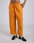 Drop Pocket Cargo Pants in Creamsicle Orange on Kira