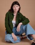 Alex has on the Cropped Corduroy Overshirt in Evergreen