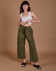 Drop Pocket Cargo Pants in Surplus Green and Cropped Tank in Vintage Tee White on Alex
