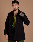 Jesse is 5'8" and wearing XS Ripstop Field Coat in Basic Black