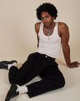 Heavyweight Trousers in Basic Black and Tank Top in vintage tee off-white worn by Jerrod