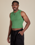 Angled front view of Muscle Tee in Seafoam Green on Isaac