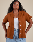Meghna is wearing Pantry Button-Up in Burnt Terracotta