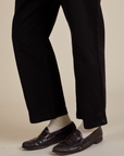 Short Sleeve Jumpsuit in Basic Black pant leg close up on Quinn