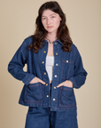Alex is 5'8" and wearing P Indigo Denim Work Jacket in Dark Wash