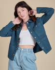 Alex is 5'8" and wearing P Denim Work Jacket in French Blue