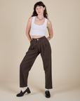 Alex is 5'8" and wearing XXS Heavyweight Trousers in Espresso Brown paired with a Cropped Tank in Vintage Tee White