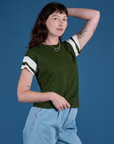 Angled front view of Painted Vintage Tee in Evergreen on Alex