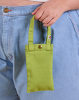 Cell Phone Tote in Gross Green held by model