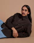 Anthony has on the Cropped Corduroy Overshirt in Espresso Brown
