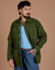 Jesse is 5'8" and wearing XS Ripstop Field Coat in Evergreen