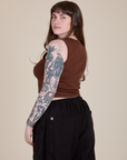 Angled back view of Muscle Tee in Fudgesicle Brown on Sydney
