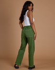 Railroad Denim Work Pants in Gross Green Overdye angled back view on Kandia