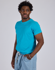 Jr. Varsity Tee in Hawaiian Blue angled front view on Isaac
