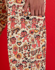 Close up of Shahana's hand on the pant leg pocket of Hot Stuff Drop Pocket Cargo Pants