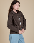 Angled front view of Denim Work Jacket in Espresso Brown on Alex