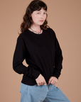 Long Sleeve Burly Tee in Basic Black angled front view on Alex