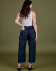 Denim Drop Pocket Pants in Dark Wash back view on Alex