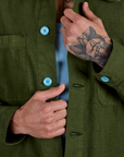 Front close up of Ripstop Field Coat in Evergreen on Jesse