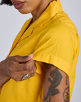 Close up of Pantry Button-Up in Sunshine Yellow sleeve on Kira