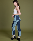 Angled back view of Mismatched Denim Carpenter Jeans on Alex