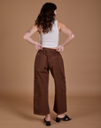Drop Pocket Cargo Pants in Fudgesicle Brown back view on Alex