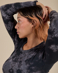 Long Sleeve Baby Tee in Black Magic Waters angled front view on Tiara