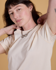 Close up of Organic Vintage Tee in Vintage Off White on Alex