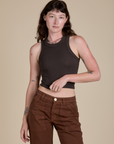Alex is 5’8” and wearing P Racerback Tank in Espresso Brown