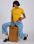 Jr. Varsity Tee in Sunshine Yellow and light wash Drop Pocket Pants on Kira