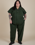 Sam is 5'10" and wearing 4XL Short Sleeve Jumpsuit in Swamp Green