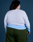 Floral Long Sleeve Baby Tee in Baby Blue back view on Sam