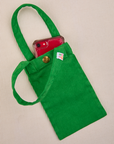 Phone tucked into kelly green Cell Phone Tote