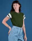 Angled front view of Painted Vintage Tee in Evergreen on Alex