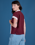 Angled back view of Painted Pantry Button-Up in Red Wine on Alex
