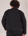 Mechanic Jacket in Basic Black back view on Miguel