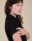 Side sleeve close up of Pantry Button-Up in Basic Black on Alex