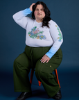 Floral Long Sleeve Baby Tee in Baby Blue and evergreen Drop Pocket Cargo Pants on Sam