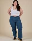 Ashley is 5’7” and wearing 1XL Work Pants in Lagoon paired with vintage tee white Cropped Tank