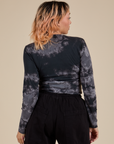 Long Sleeve Baby Tee in Black Magic Waters back view on Tiara