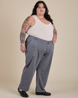 Angled front view of Work Pants in Washed Grey and Tank Top in Vintage Tee Off-White on Sam